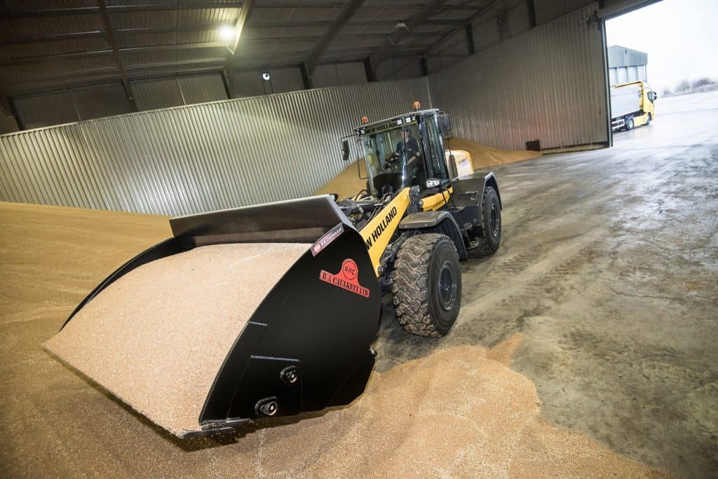 Aggregates Loaded into Trailer With Ease B. A. Caulkett high tip buckets - Loading Shovel Attachments