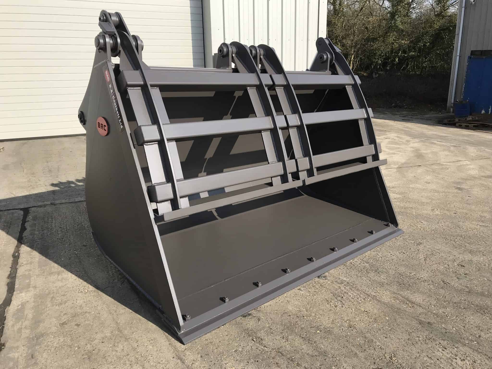 High Tip Bucket Clamp B. A. Caulkett - Loading Shovel Attachments