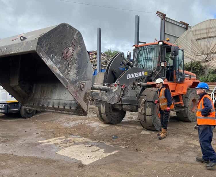 High Tip Bucket on Doosan operating in scrap yard B. A. Caulkett 5