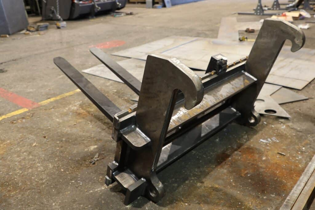 Pallet Forks being manufactured B. A. Caulkett backJPG