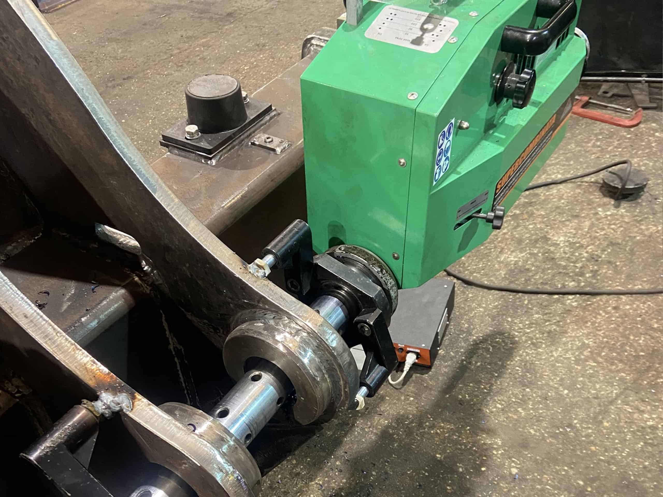 line boring of high tip bucket attachment B. A. Caulkett