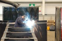 Welder fabricating Pusher blade B. A. Caulkett 9JPG