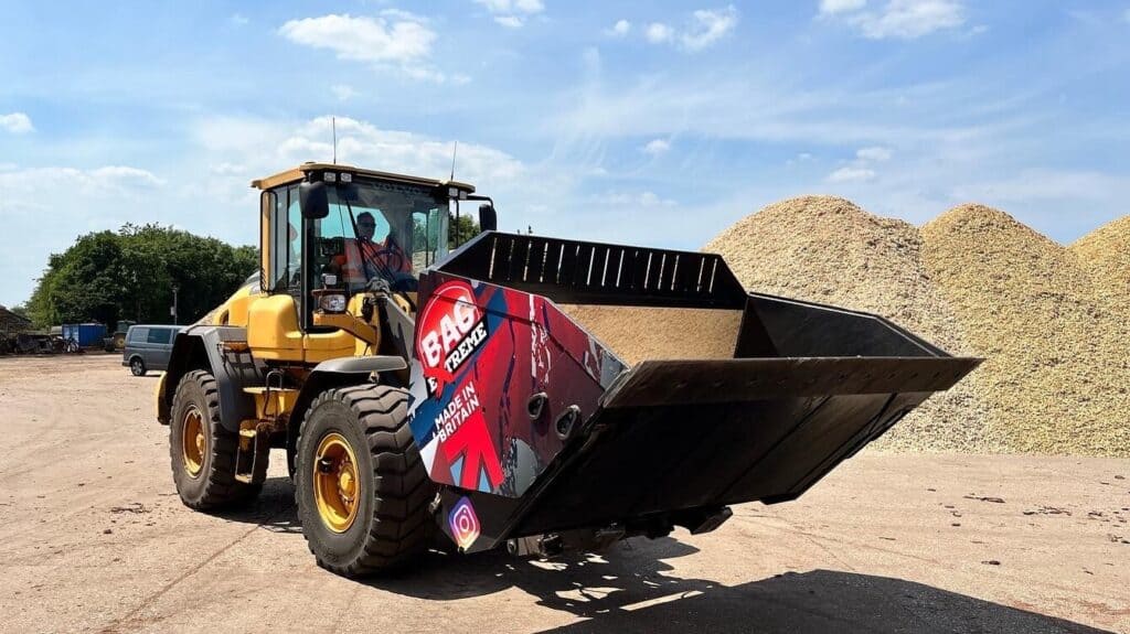 Ultra Plus High Tip Bucket on VolvoL90H picking up chips bucket raised R to L 1