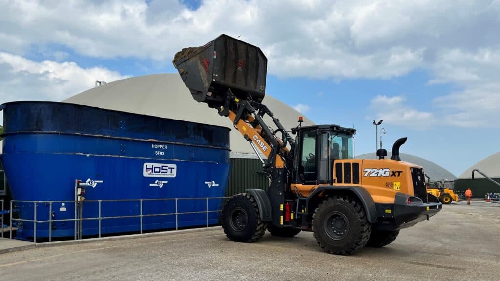 High Tip Bucket on Case721Gxt B. A. Caulkett tipping into container