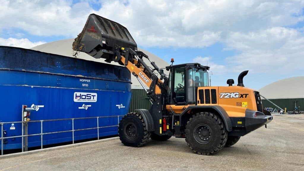 High Tip Bucket on Case721Gxt B. A. Caulkett tipping into container 7
