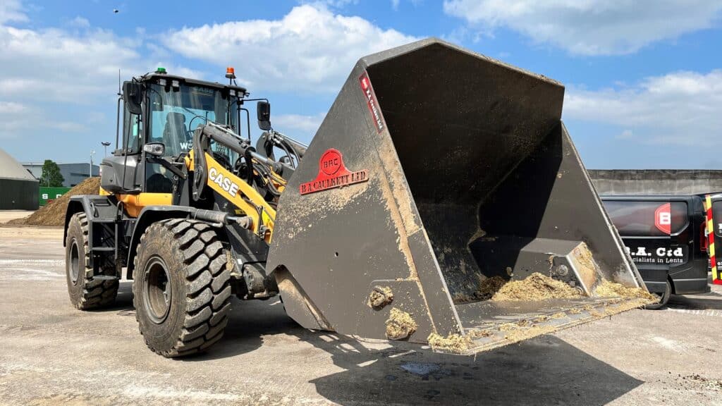 High Tip Bucket on Case721Gxt B. A. Caulkett tipping left to right 2