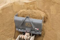 extreme high tip bucket loading sand BA CAulkett bucket raised top view