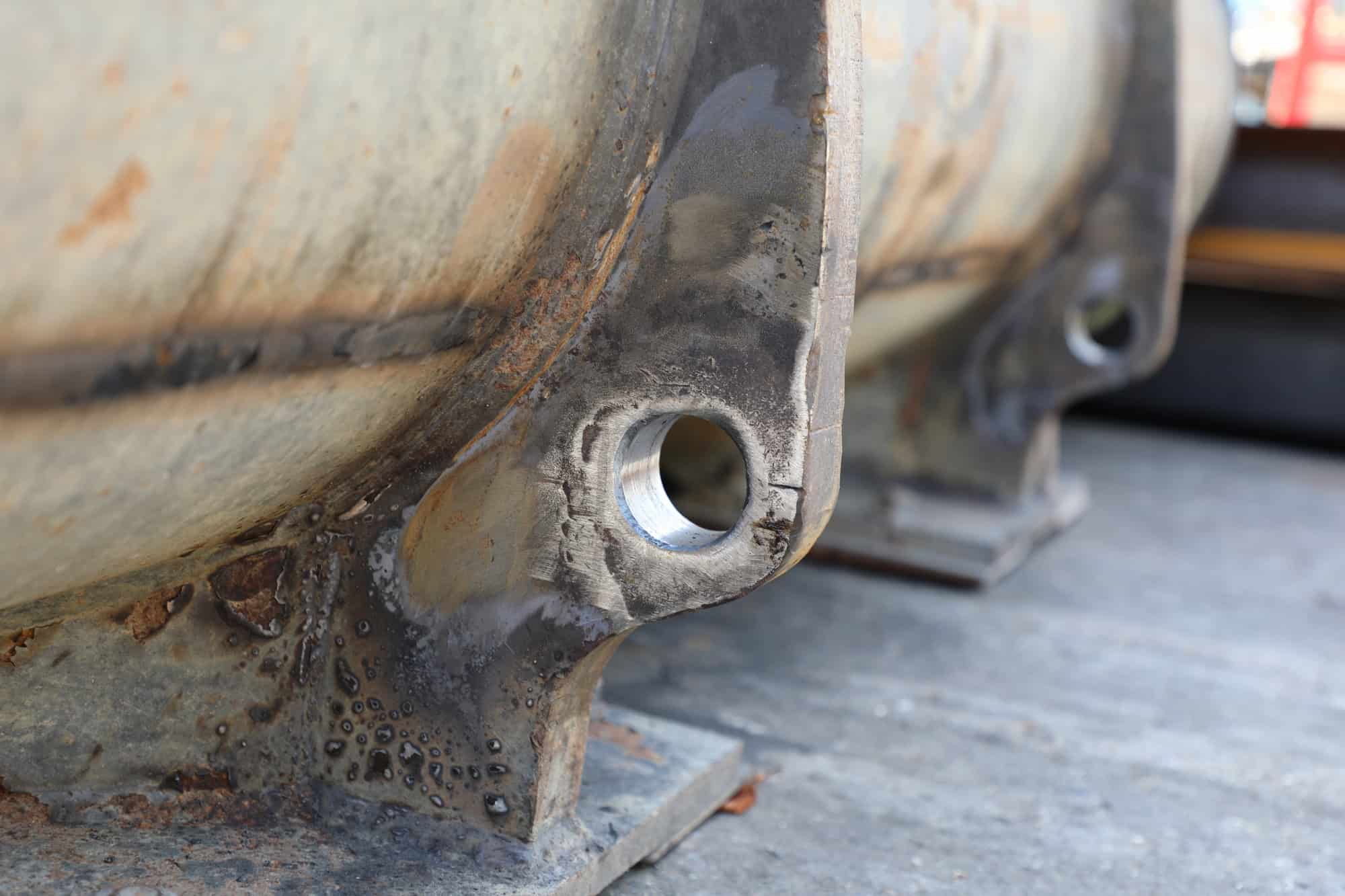 BA Caulkett Refurbishment of Loading Shovel Attachments 1E0A0019 24 bottom mounts rebushed and machinedJ